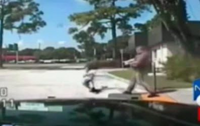 Cop tasers handcuffed girl in back, now brain-dead
