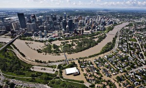 The Bow River over flows its banks into the downtown core and residential areas in Calgary, Alberta