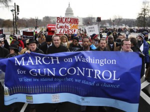 Washington DC Mayor Vincent Gray helps lead the March on Washington for Gun Control on the National Mall in Washington